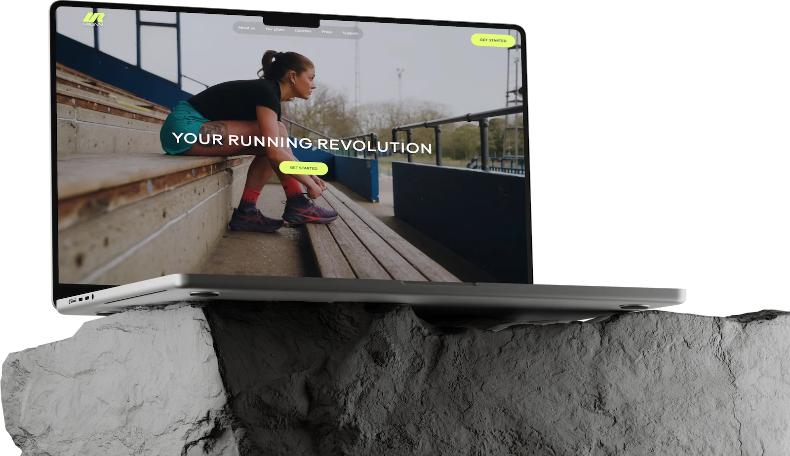 URUNN running coaching website shown on a laptop