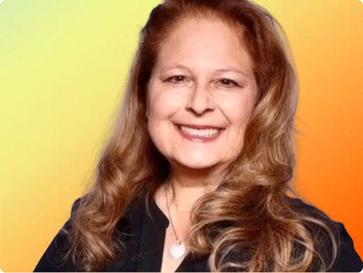 Clarissa Cerda headshot on orange gradient background
