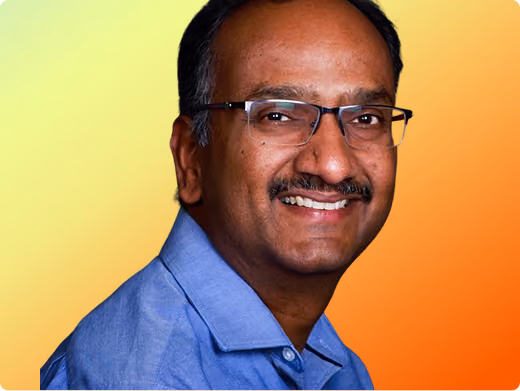 Neeraj Gupta headshot on orange gradient background