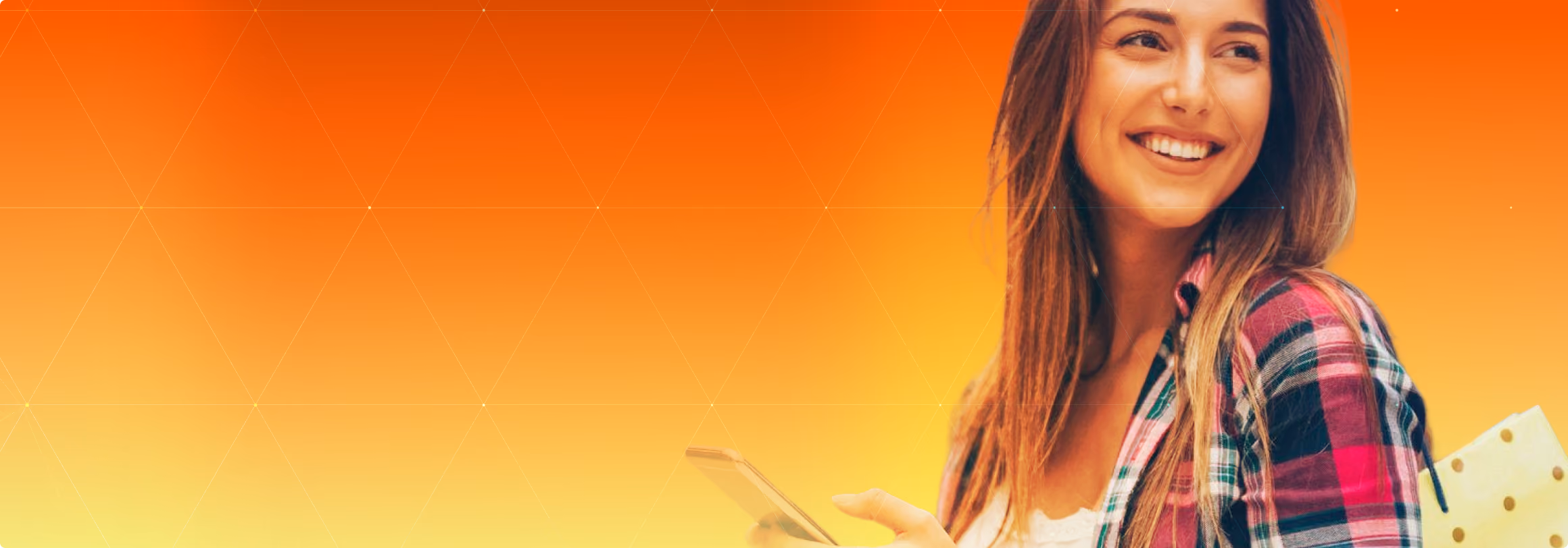 Smiling woman holding cell phone on orange gradient background