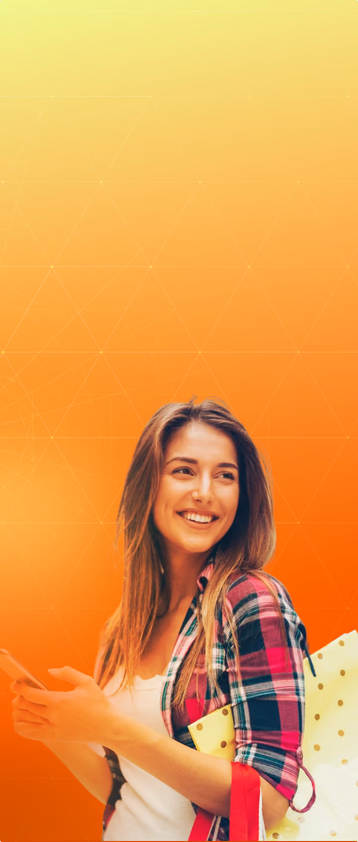 Smiling woman holding cell phone on orange gradient background