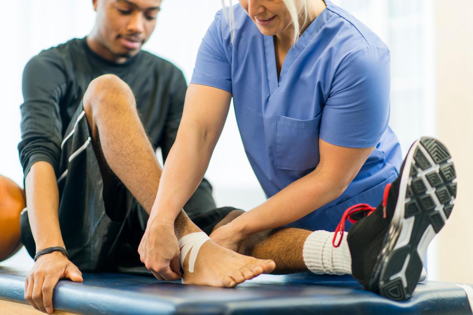 PT&SR physical therapist working one-on-one with a patient