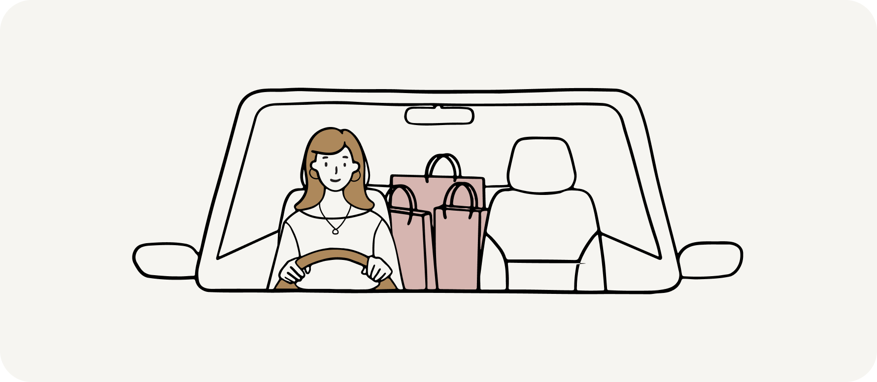 Woman sitting in the driver's seat of a car with shopping bags on the back seat.