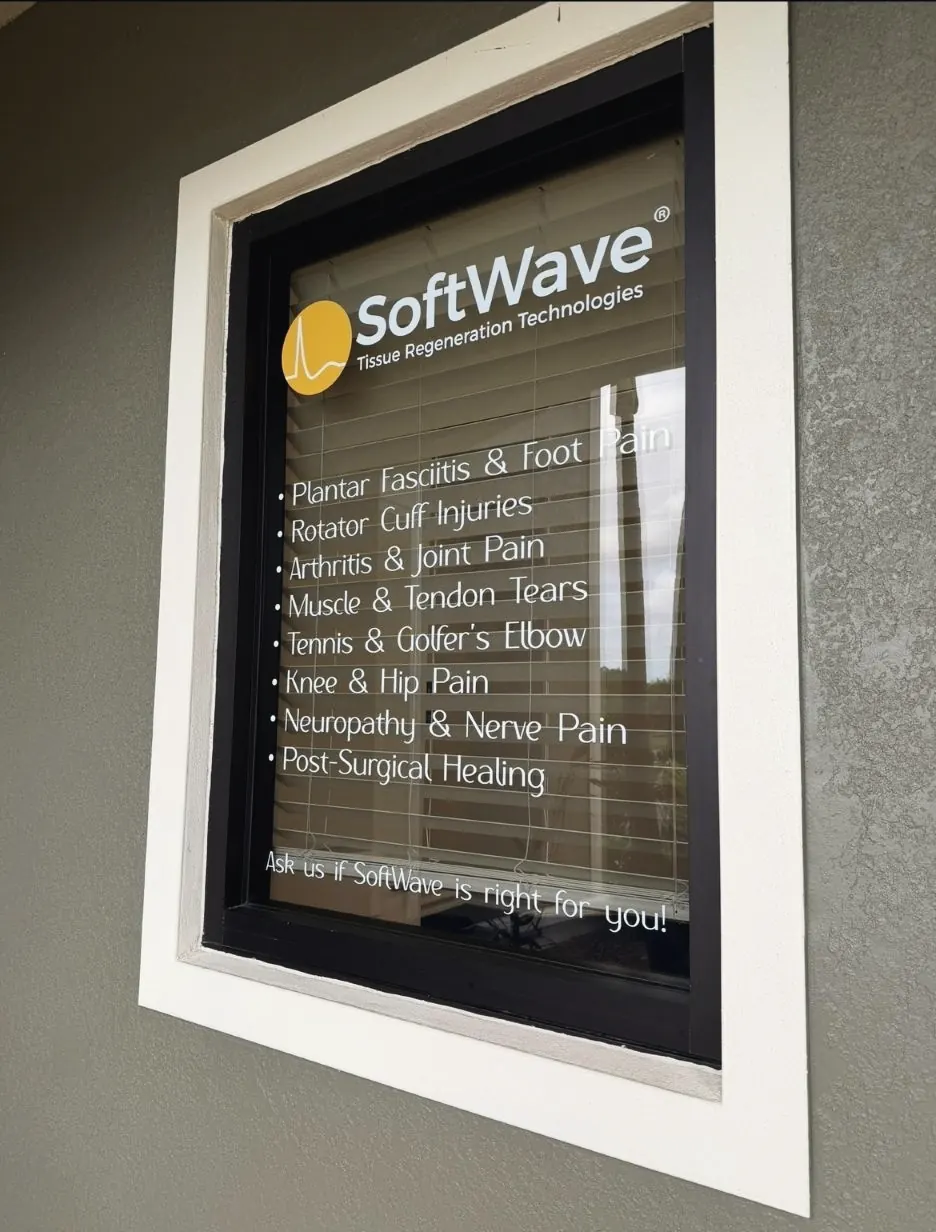 SoftWave tissue regeneration conditions listed on the office window