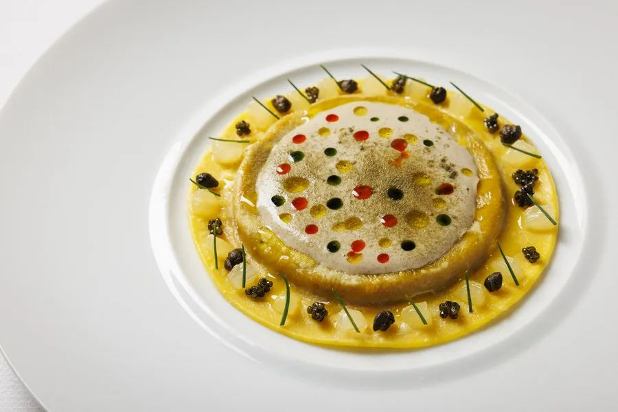 Artfully plated seasonal tasting course at Amphora, a fine dining restaurant offering a wine-first tasting menu in Manhattan’s Flatiron District.