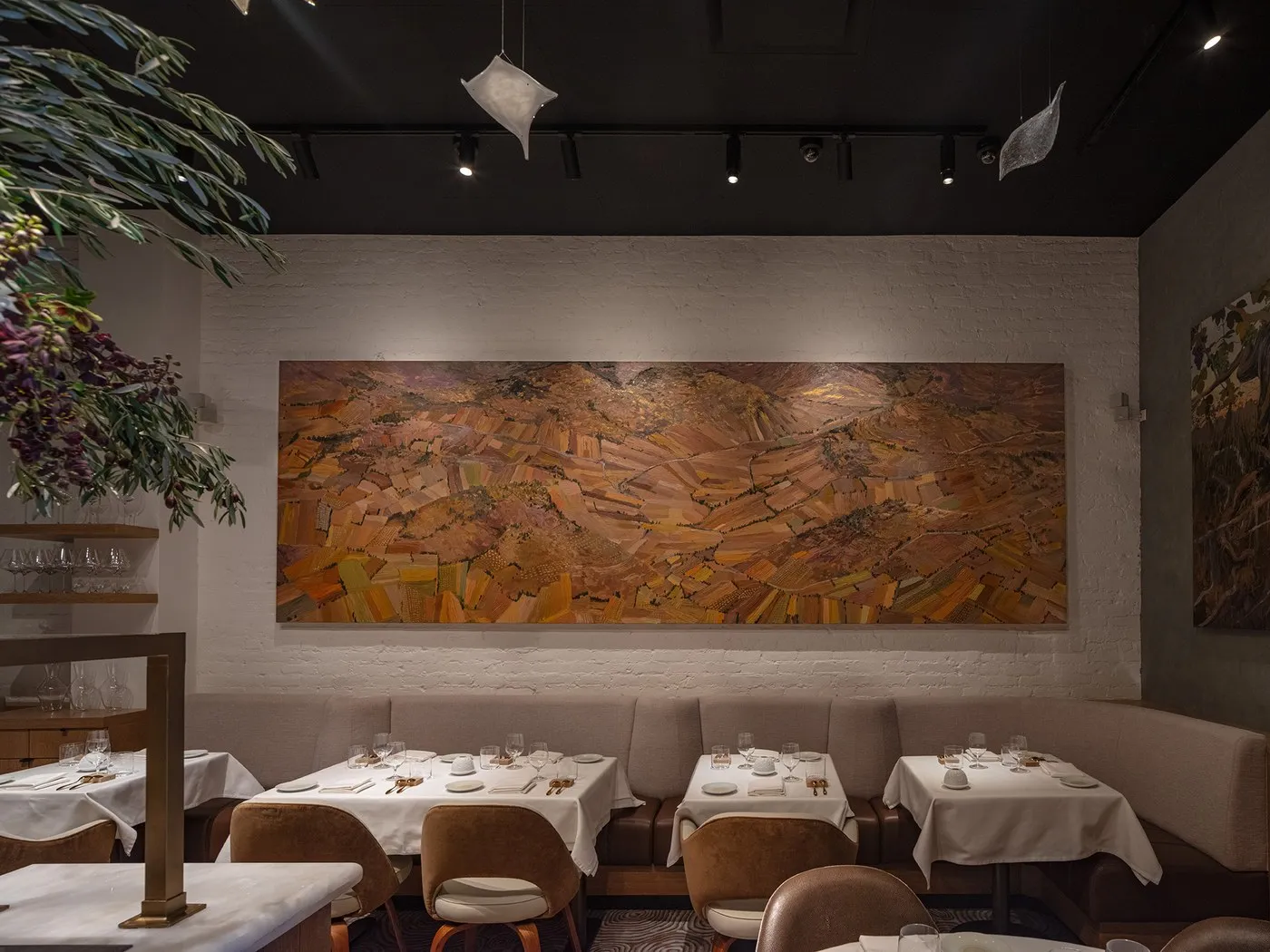 Refined dining room at Amphora, an intimate destination for tasting menus and wine pairings in Flatiron.