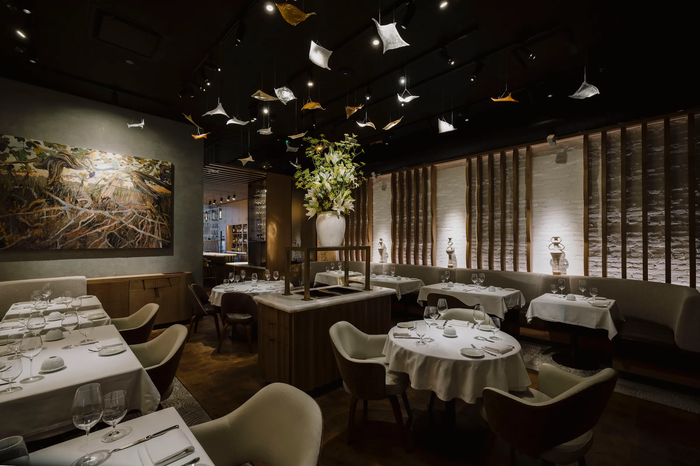 The elegant dining room at Amphora, a wine-first fine dining restaurant in Manhattan’s Flatiron District featuring an intimate atmosphere and contemporary design.