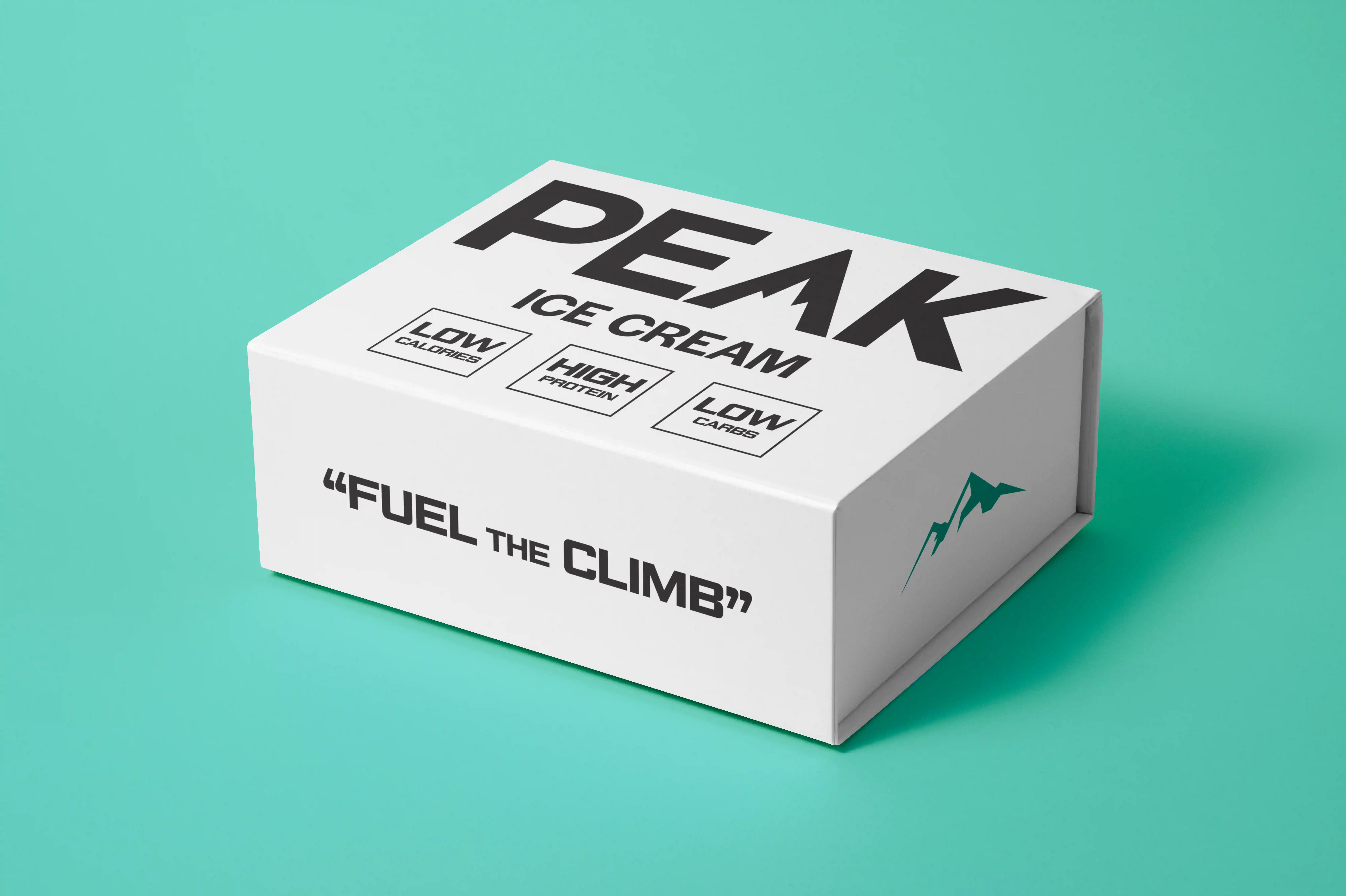 White box of PEAK ice cream with labels low calories, high protein, low carbs on teal background.
