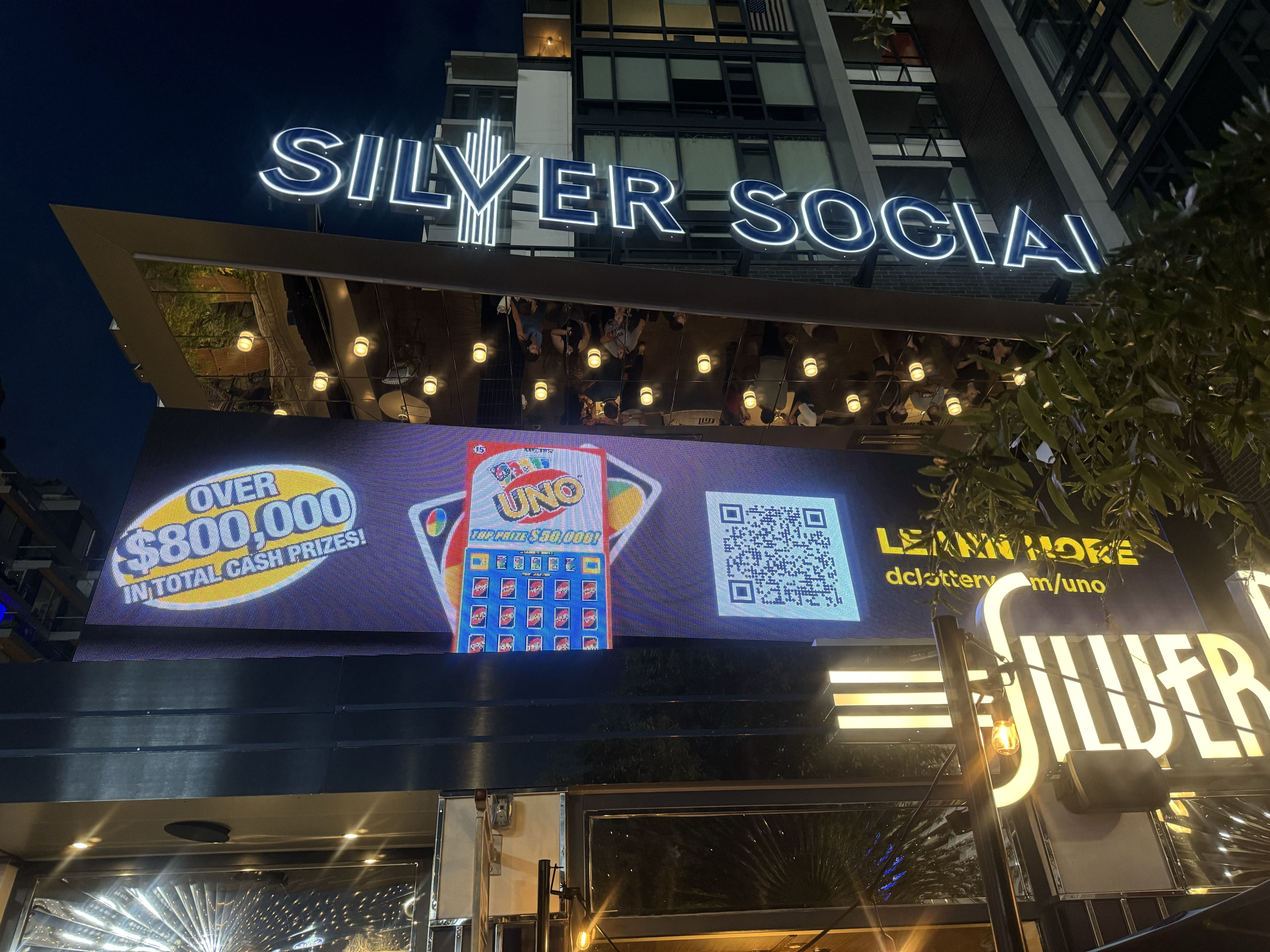 Photograph of the DC Lottery Uno scratcher campaign in a retail environment