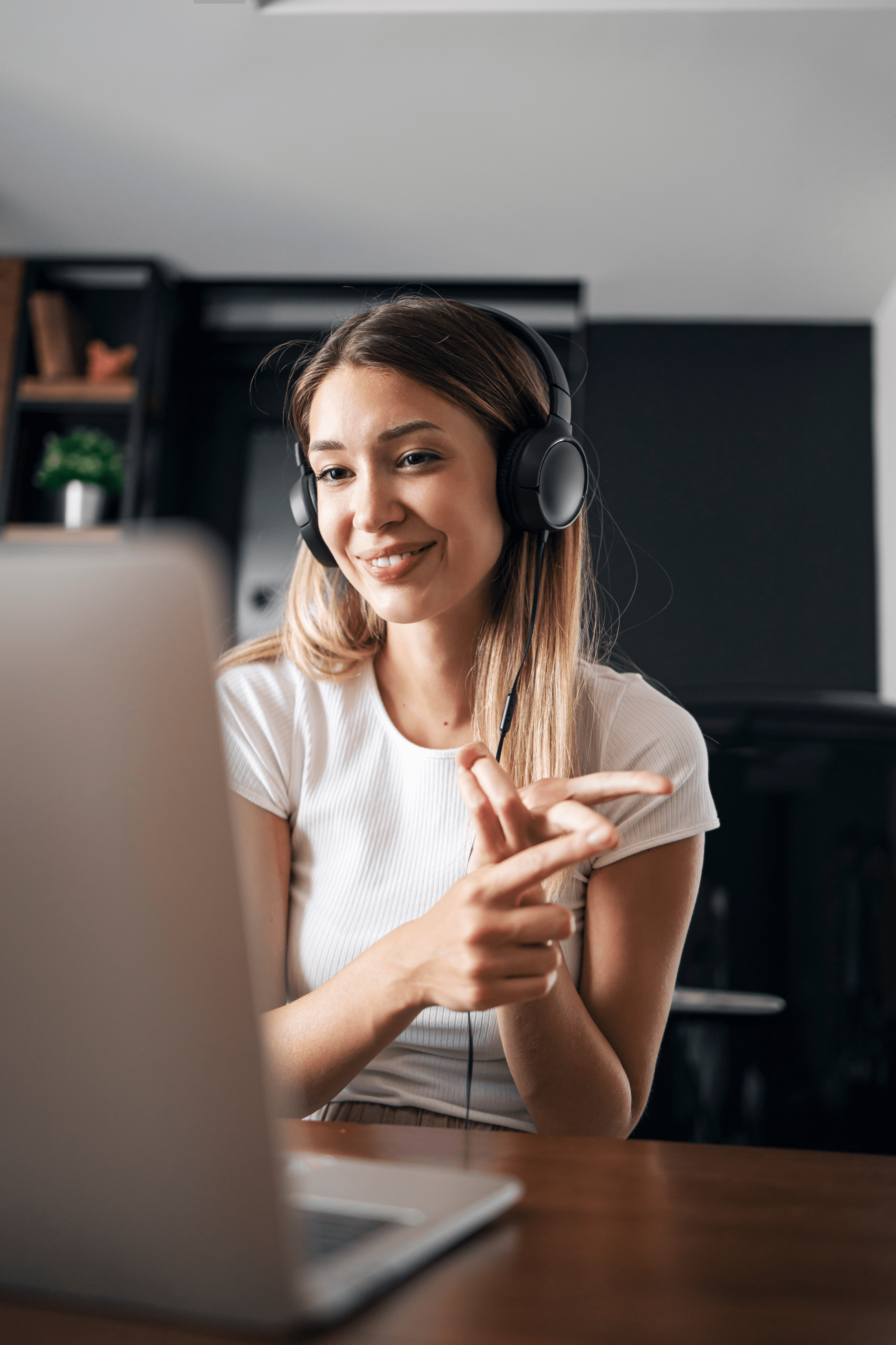 Patient smiling during a video consultation with a Cheshire Clinics GP