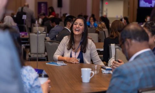 A business owner meeting a buyer at the 2025 conference