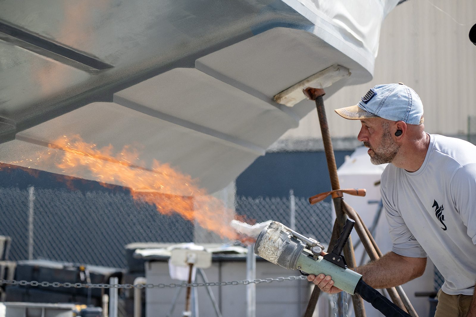 Two-person crew applying Aquaphobix™ at the yard