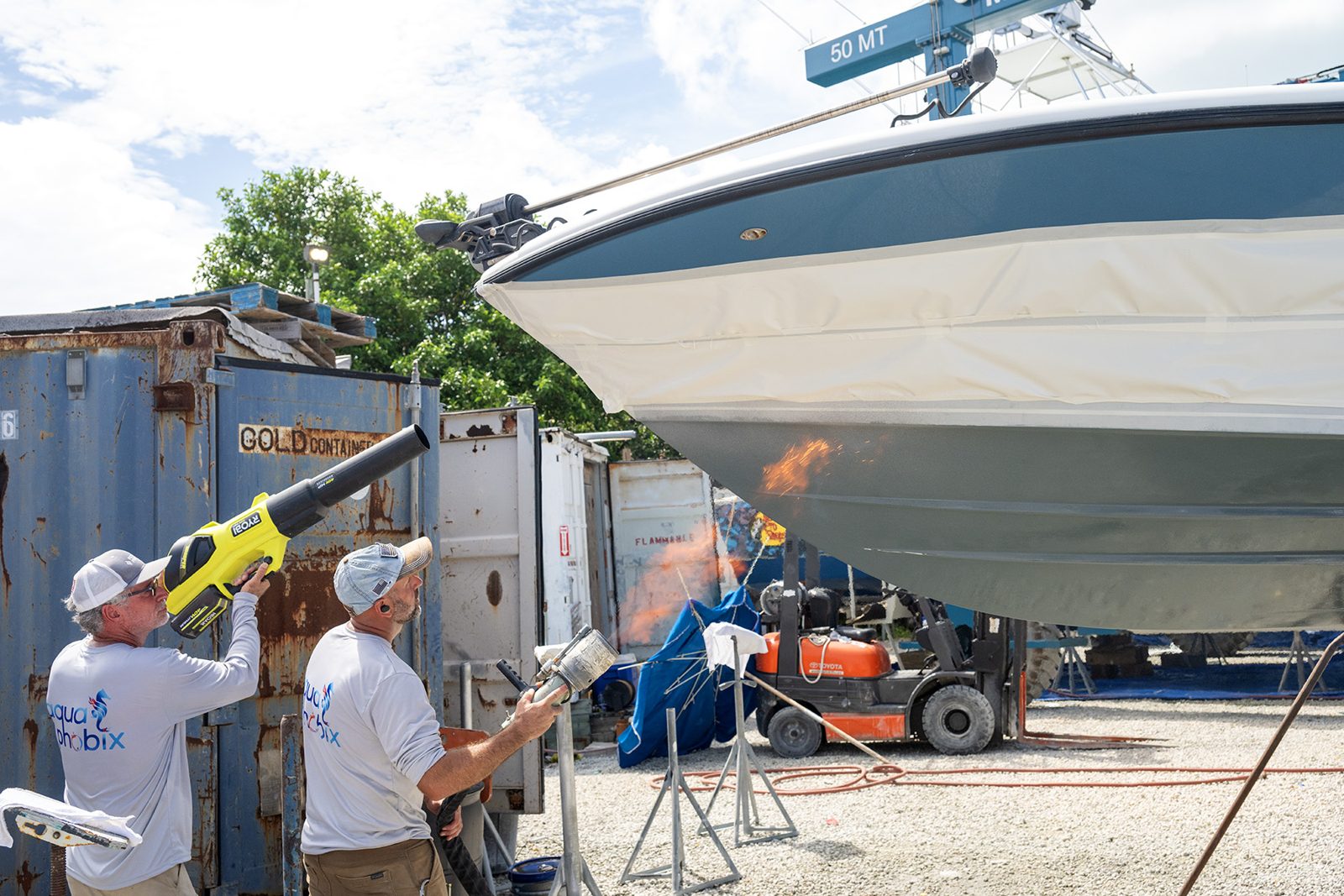 Licensed dealers heat-embedding Aquaphobix™ on the Yellowfin's hull