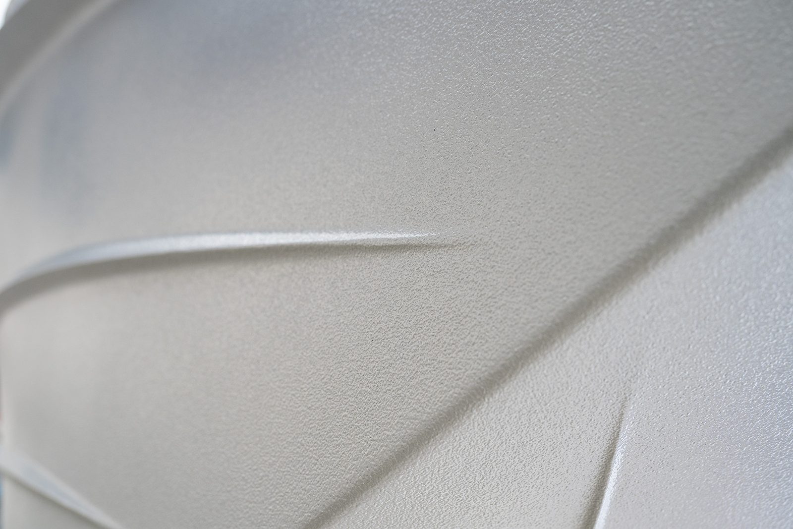 Close-up of the Aquaphobix™ coating texture along a hull strake