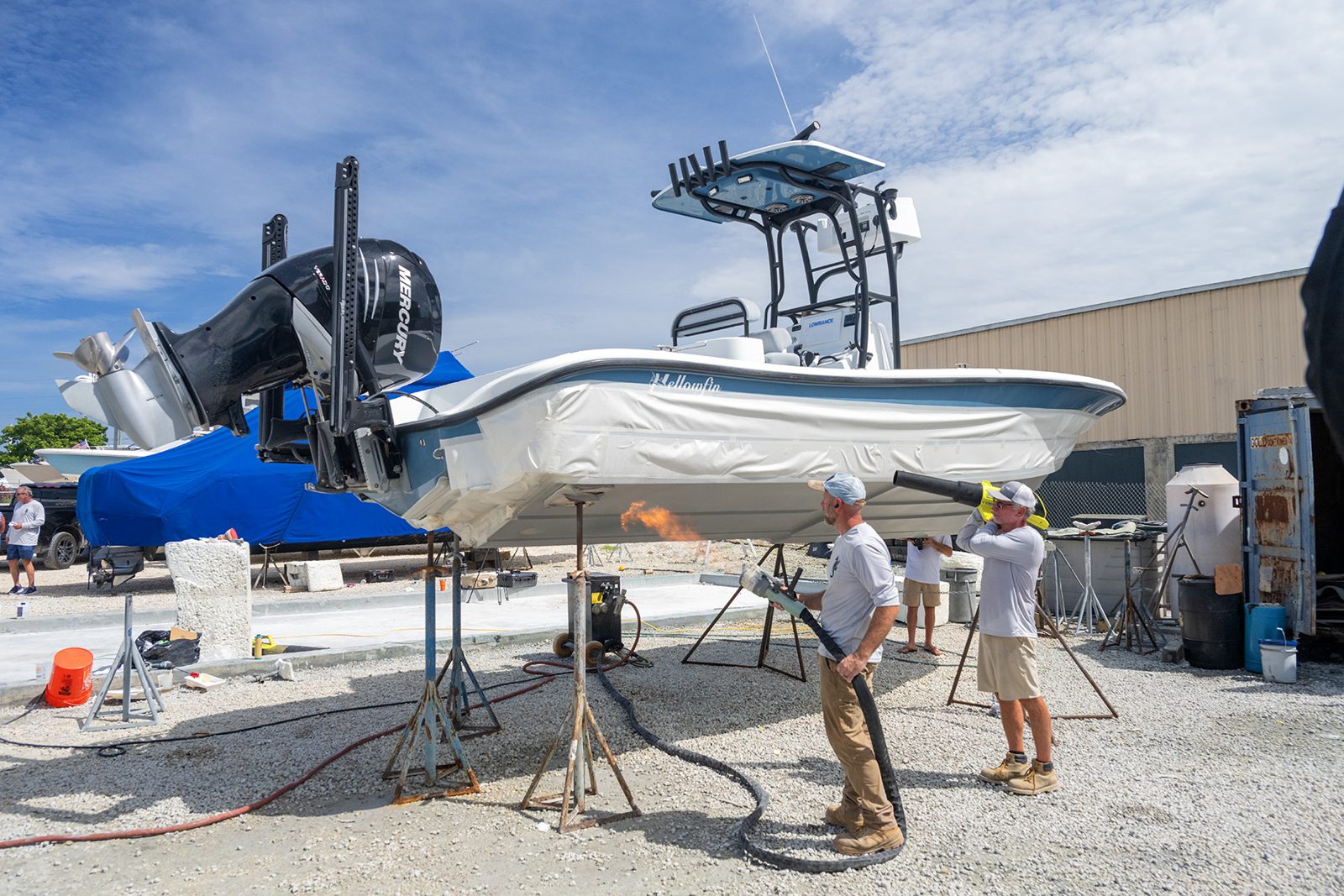 A 26-foot Yellowfin on stands on the day of its Aquaphobix™ application