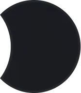 Dark circle with a slightly lighter crescent shape on the left side, resembling a partial lunar eclipse against a black background.