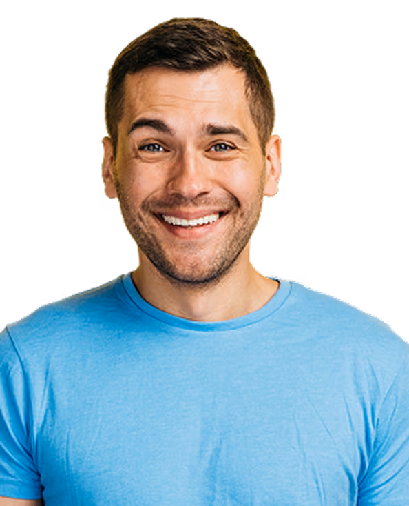Smiling young man with short brown hair wearing a light blue shirt, looking directly at the camera.