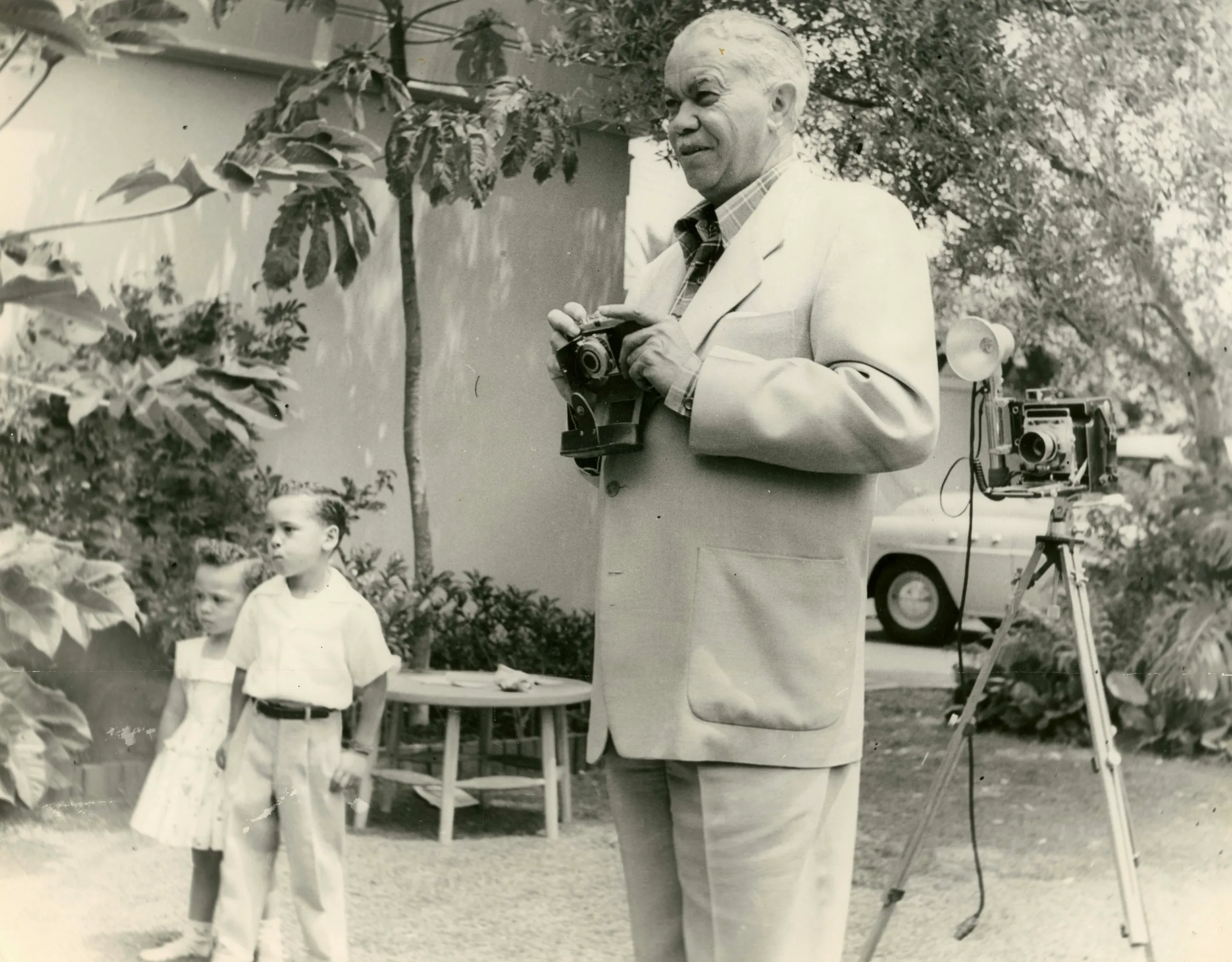 Williams photographing his grandchildren