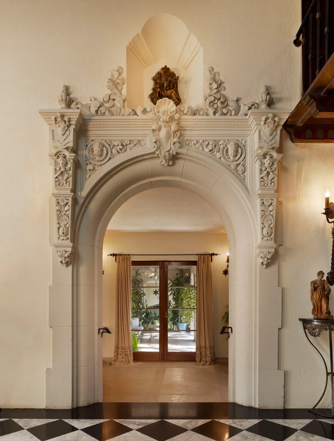 Carved arch portal