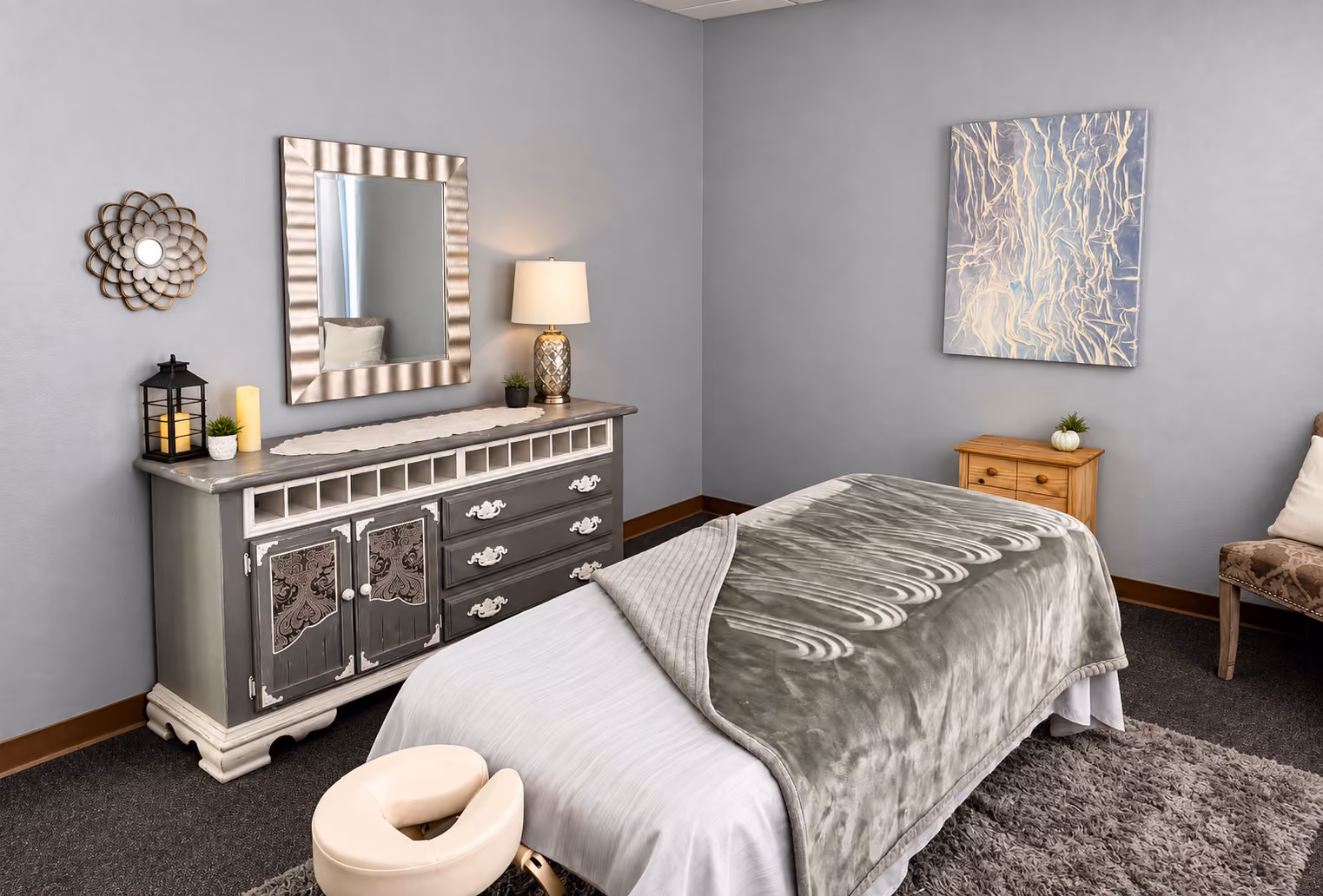 Metal element room with a massage table and silver decor