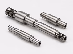 Three precision metal shafts with different sizes and threaded ends on a white background.