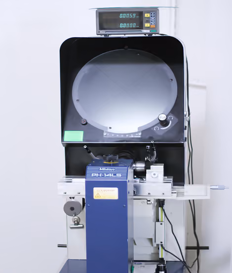 Mitutoyo PH-14LS optical comparator machine with digital display showing measurement values.