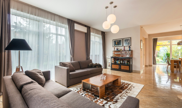 Living room with polished stone floors