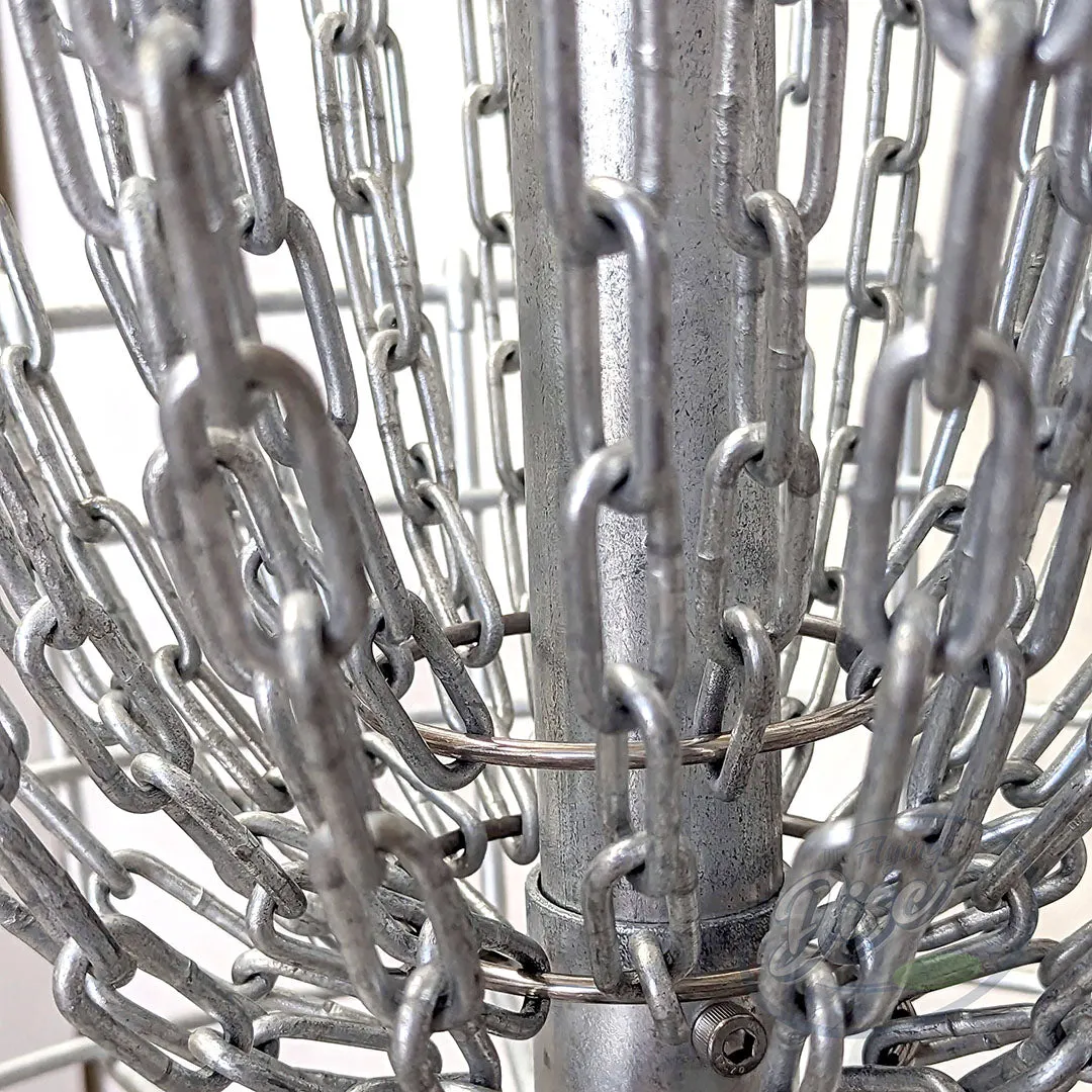Close-up of the RAD ACE V2 disc golf basket chain configuration around the galvanised centre pole.