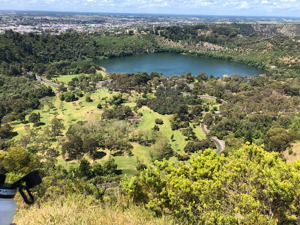 An elevated view across the Blue Lake crater and the parkland around it.
