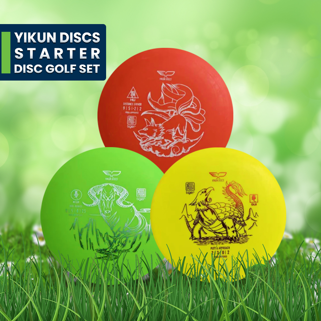 Yikun starter disc golf set: red, green and yellow discs with illustrated stamps, resting on grass.