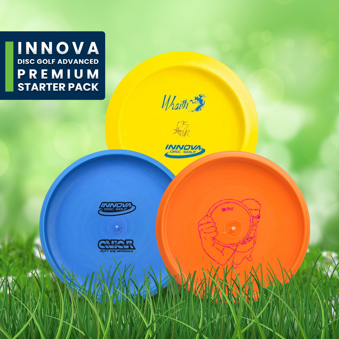 Innova advanced premium starter pack: yellow, blue and orange discs resting on grass.