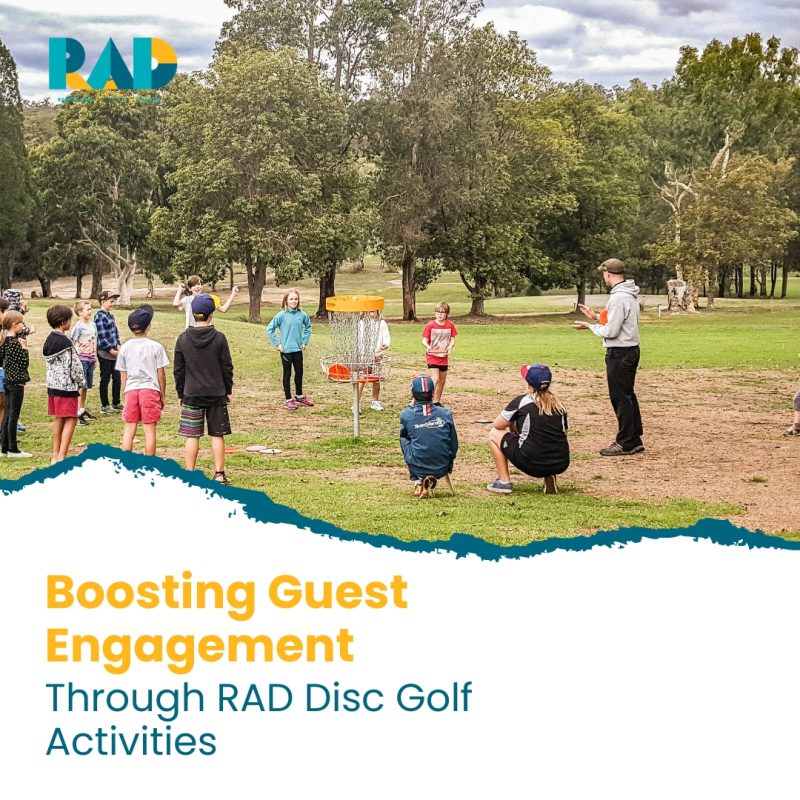 RAD card reading boosting guest engagement through RAD disc golf activities, showing a group playing around a basket.