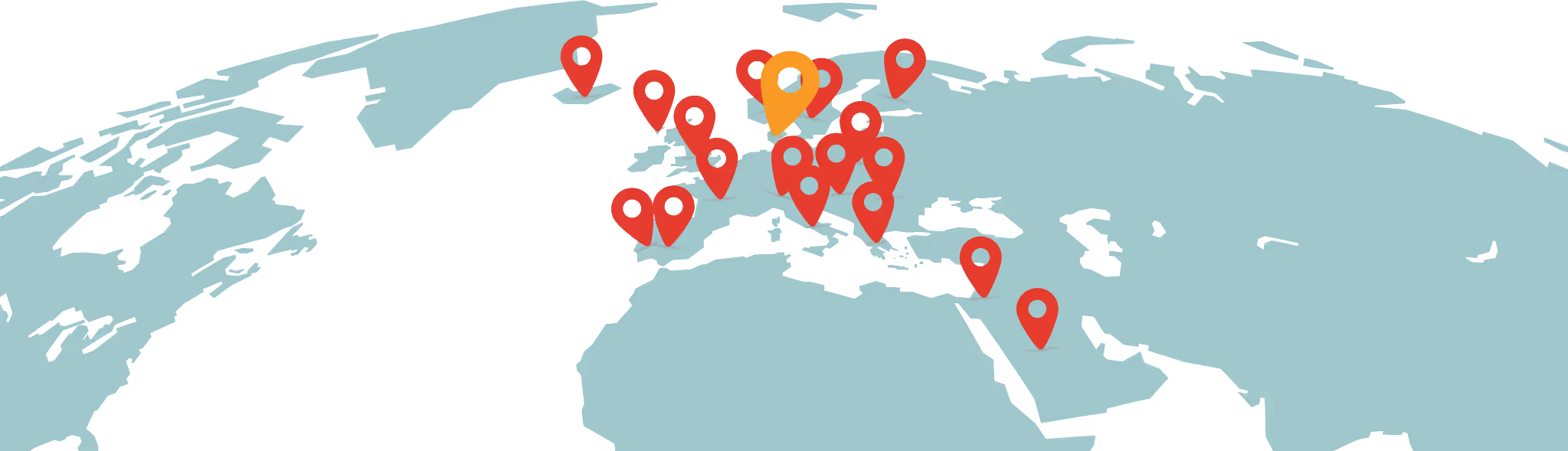 A map of the world with a bunch of pins.