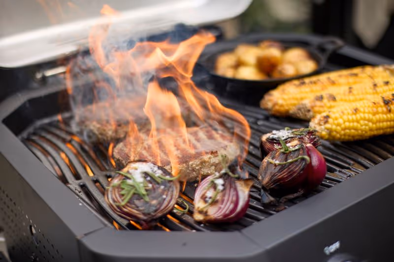 A grill that has some food on it.