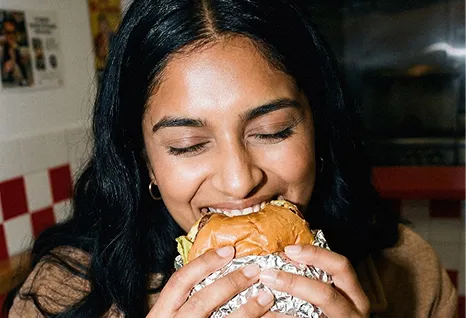 Woman enjoying a meal at a restaurant