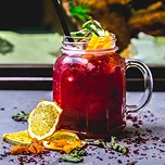 Berry lemonade with fresh lime and mint