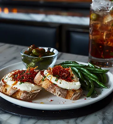 Toasted bread with vegetables and sauce