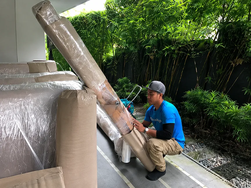 Spaceship mover protecting and preparing bulky furniture for door-to-door storage collection