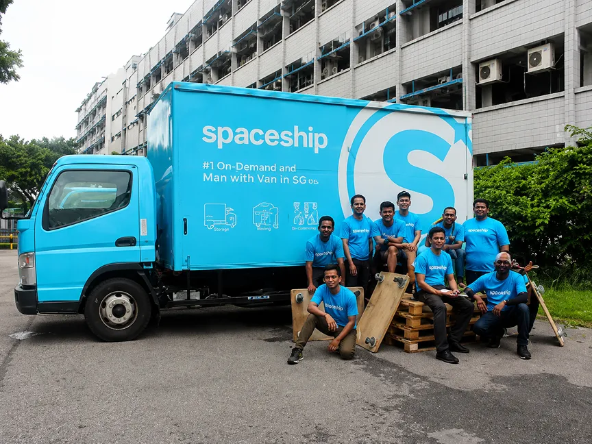 Spaceship moving team with branded vehicles providing professional storage collection services