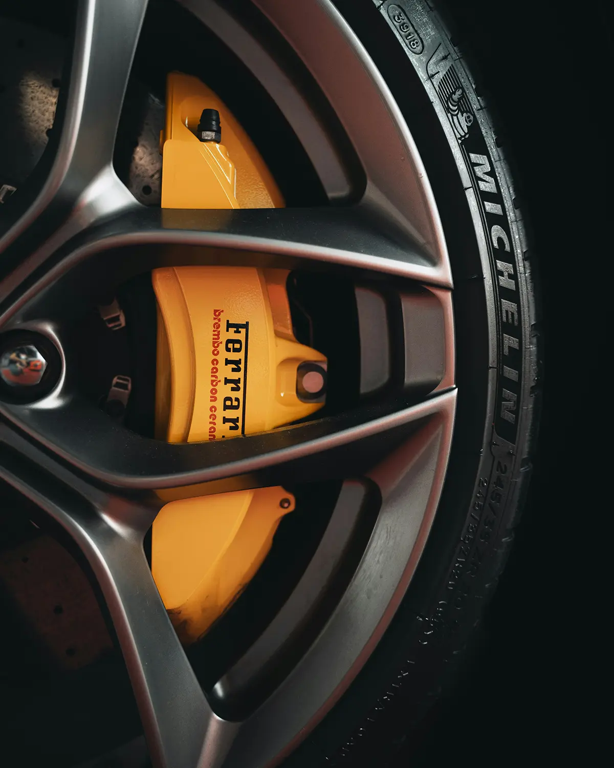 Ferrari wheel with yellow brake calliper