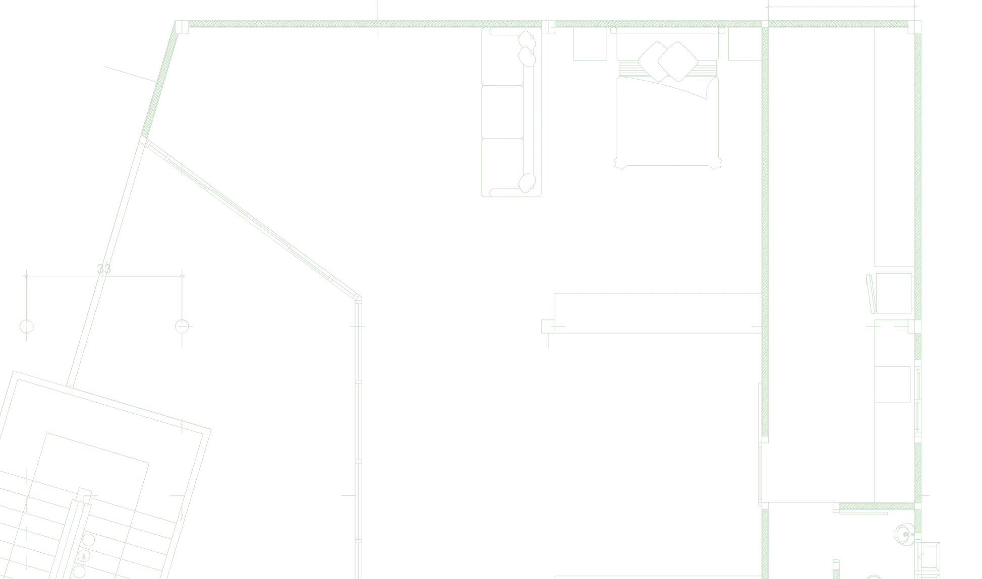 Architectural floor plan showing room layout with a bed, furniture, and walls in a building.