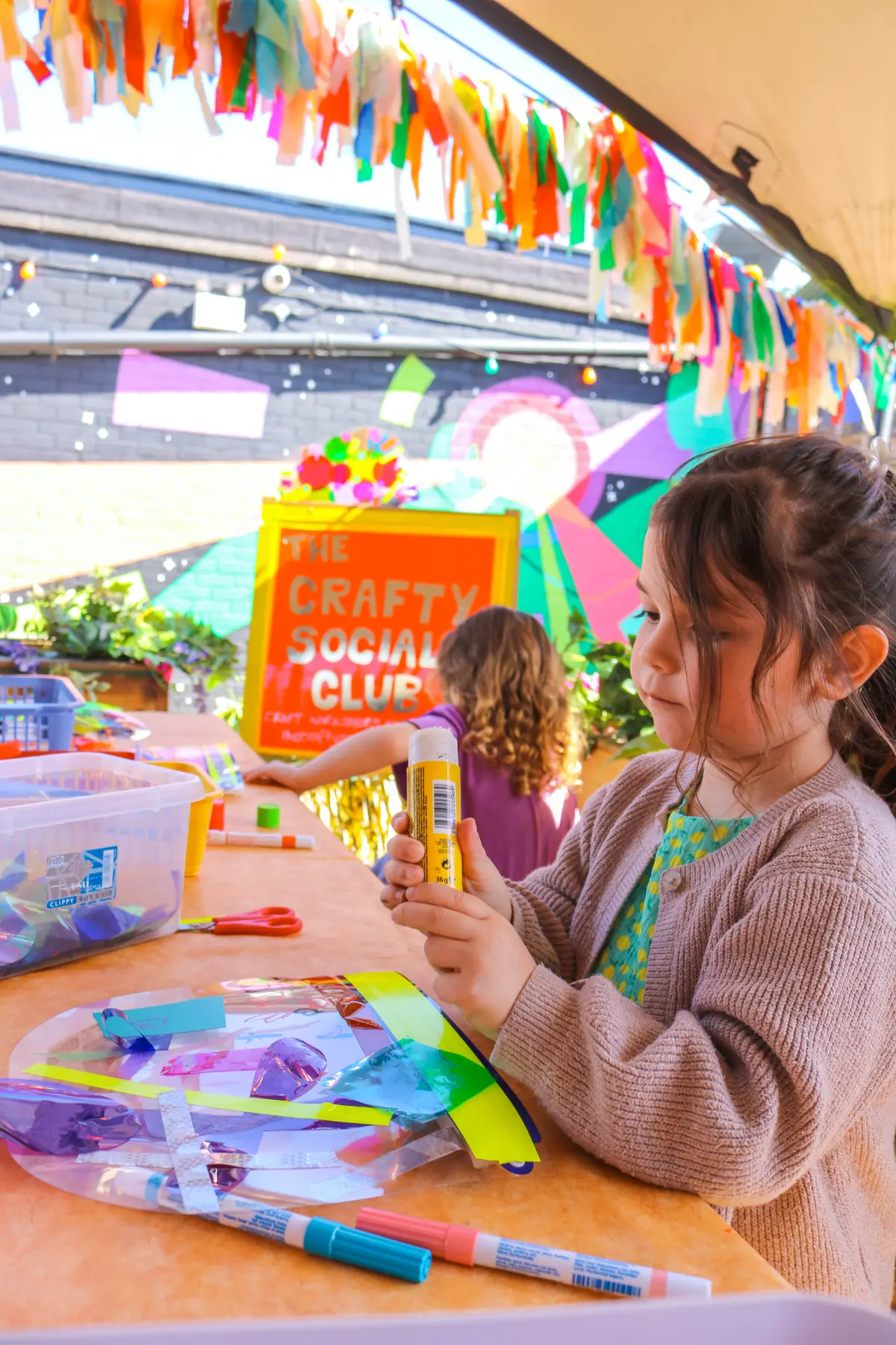 Children creating artwork during a free drop-in Craft Session at Wake The Tiger