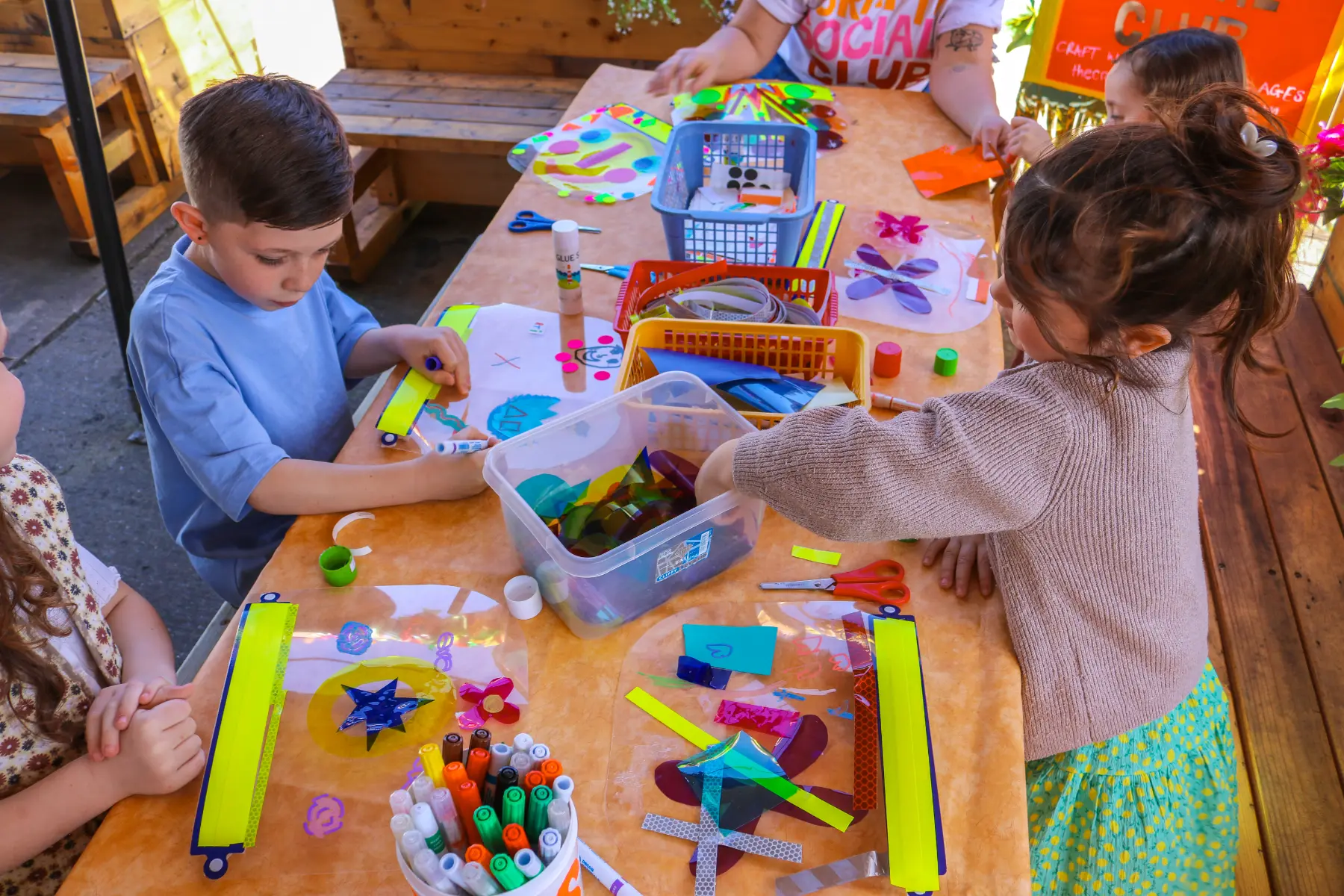 Kids taking part in creative activities at a Wake The Tiger Craft Session