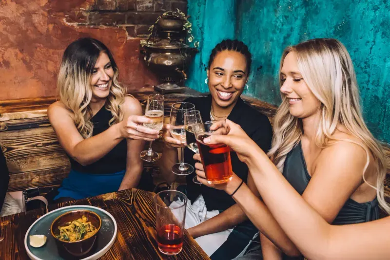 People eating and drinking.