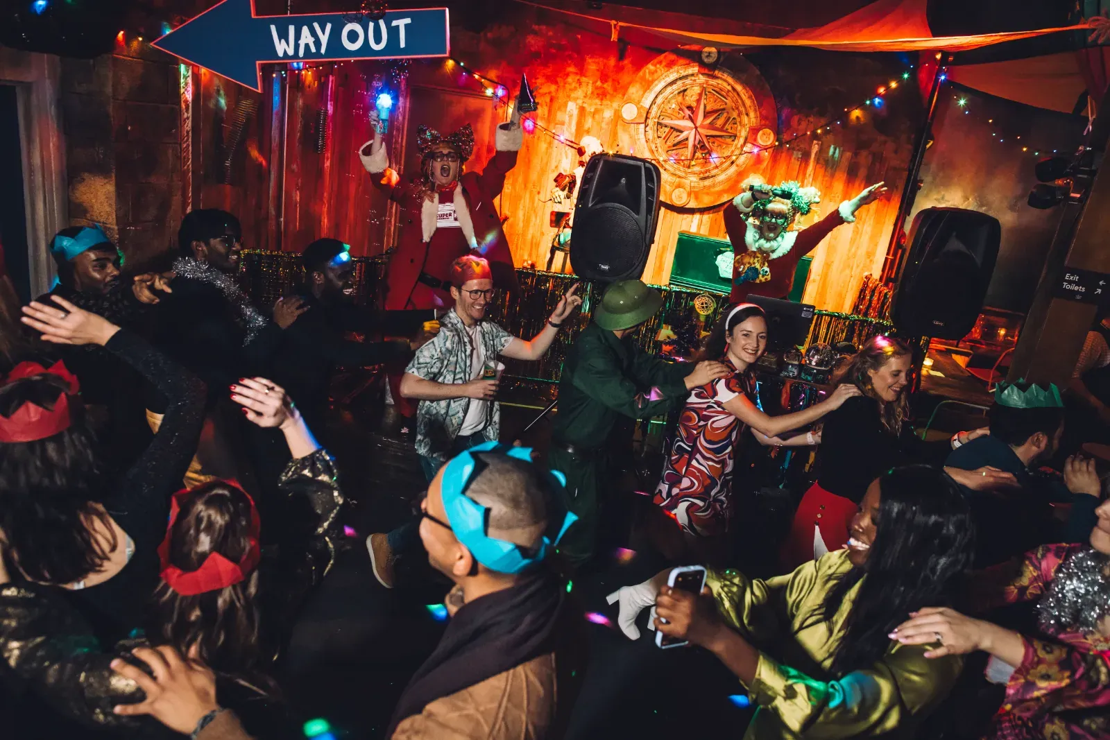 People dancing at a Christmas party at Wake The Tiger