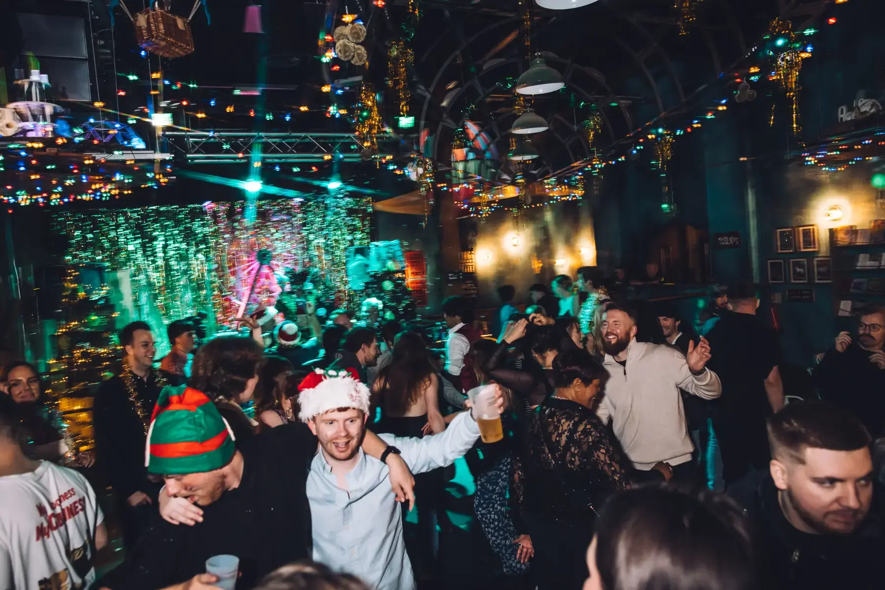 People dancing at a Christmas party at Wake The Tiger