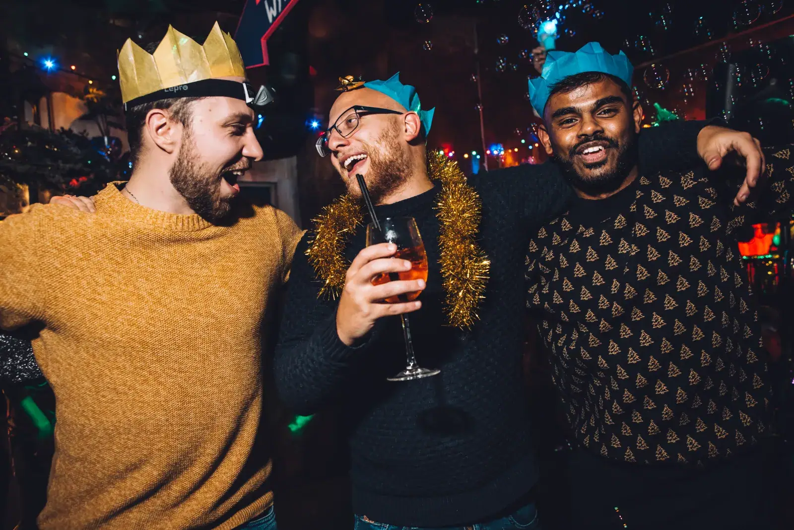 Friends celebrating a Christmas party at Wake The Tiger