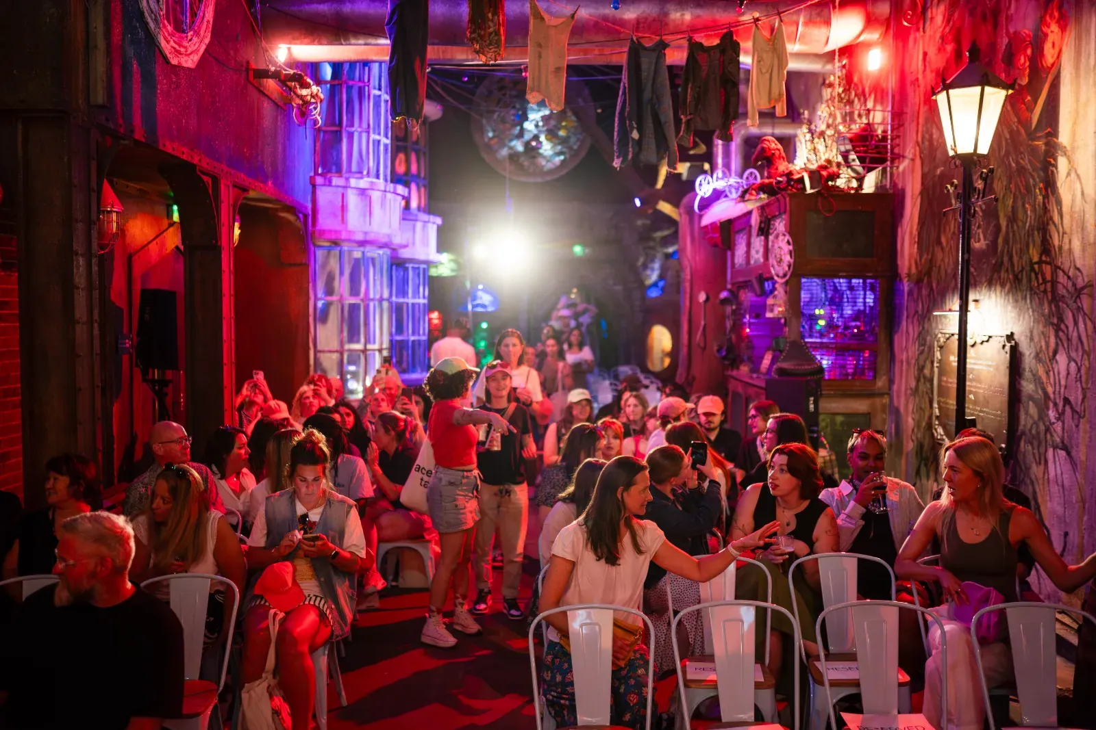 Crowded party scene at a Wake The Tiger After Hours event