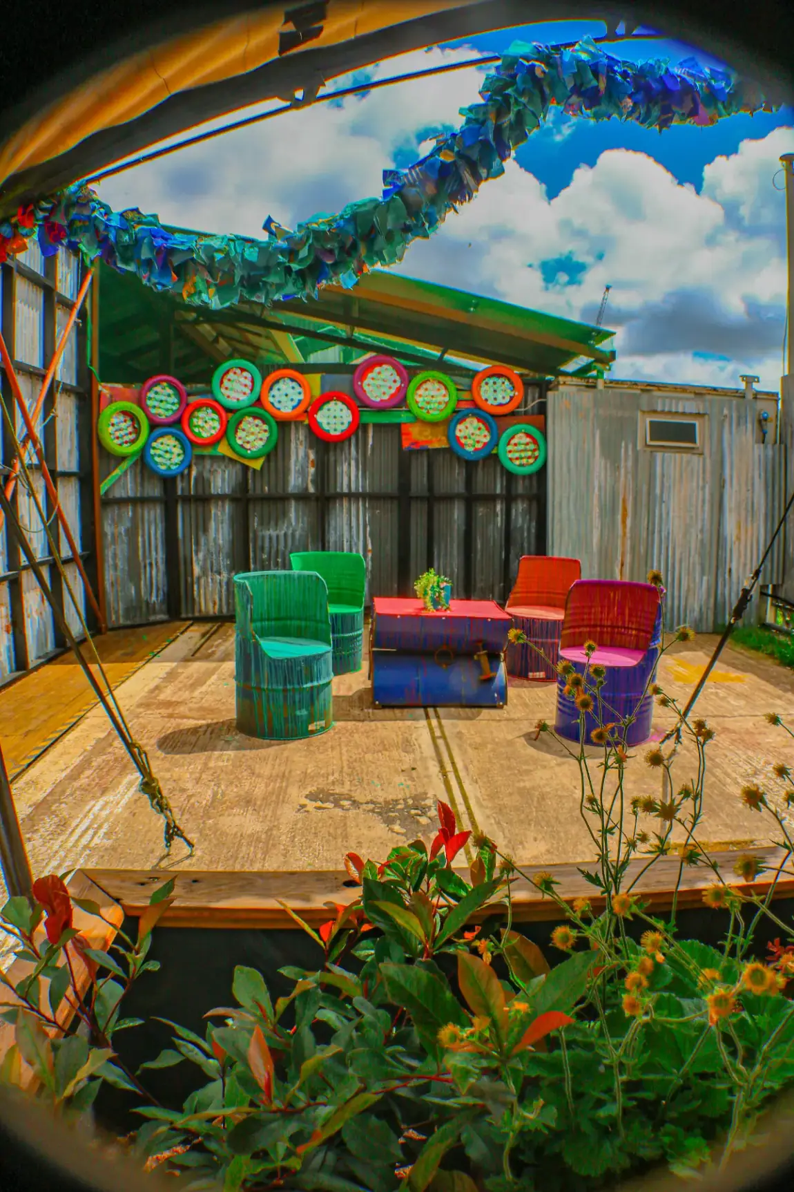 Colourful outdoor furniture on the Junkyard patio at Wake The Tiger