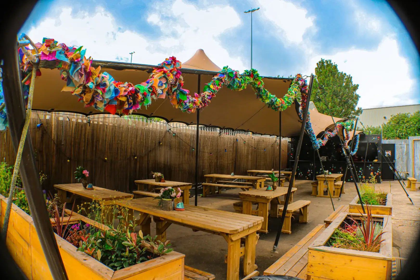 Colourful outdoor patio set up for a festival at Wake The Tiger